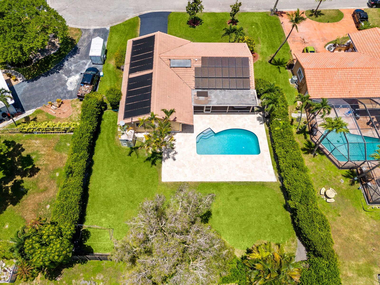 Aerial daytime view of the pool and backyard