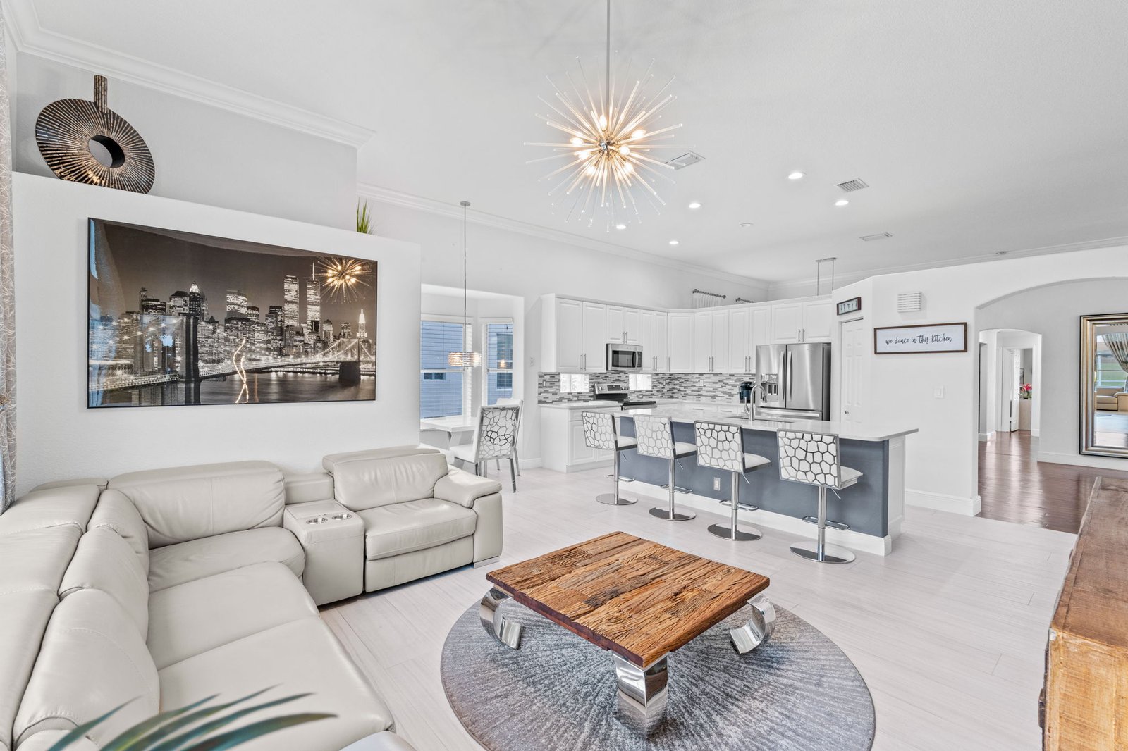 Great room with kitchen island and seating