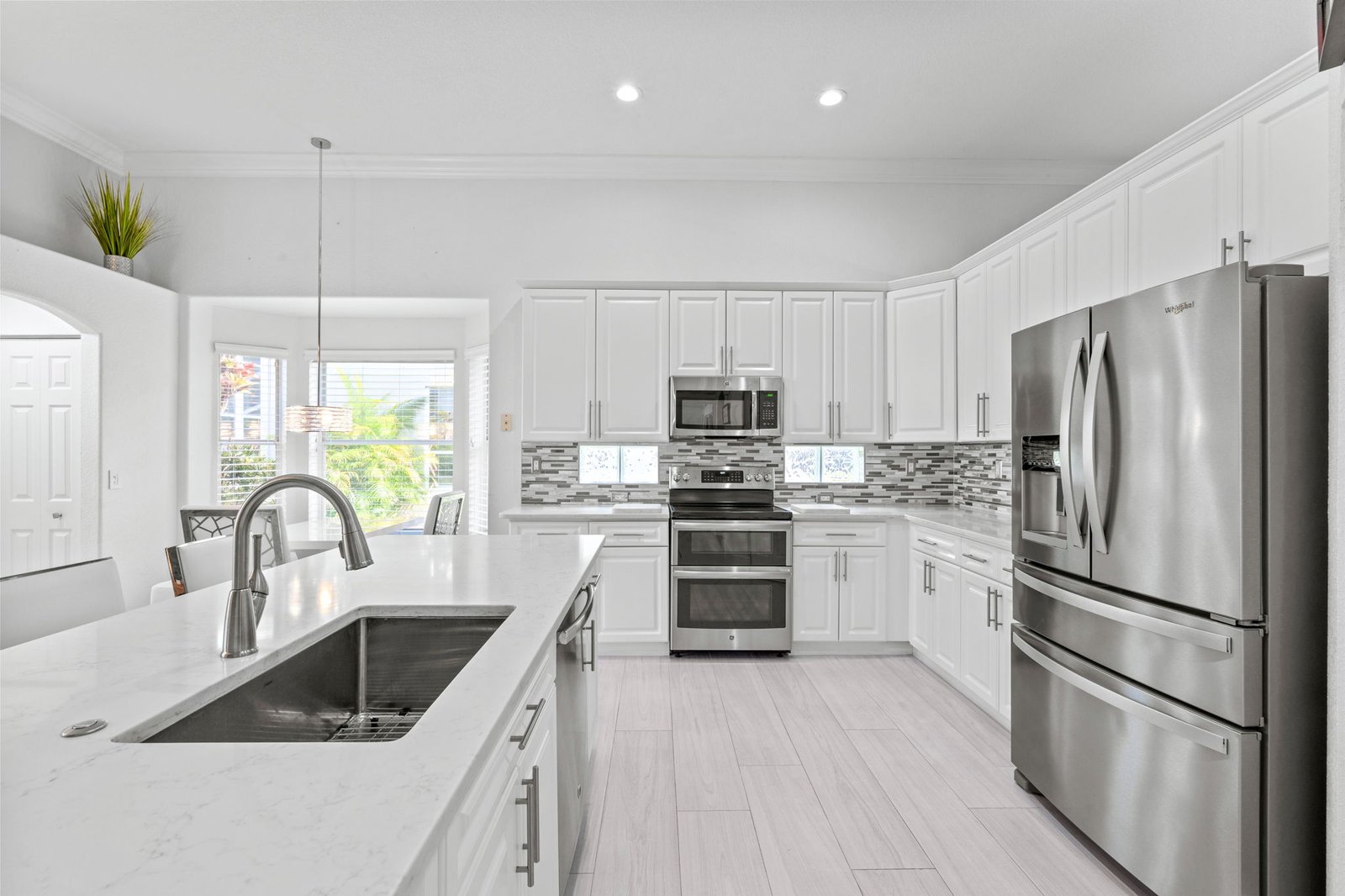 Kitchen with white cabinetry