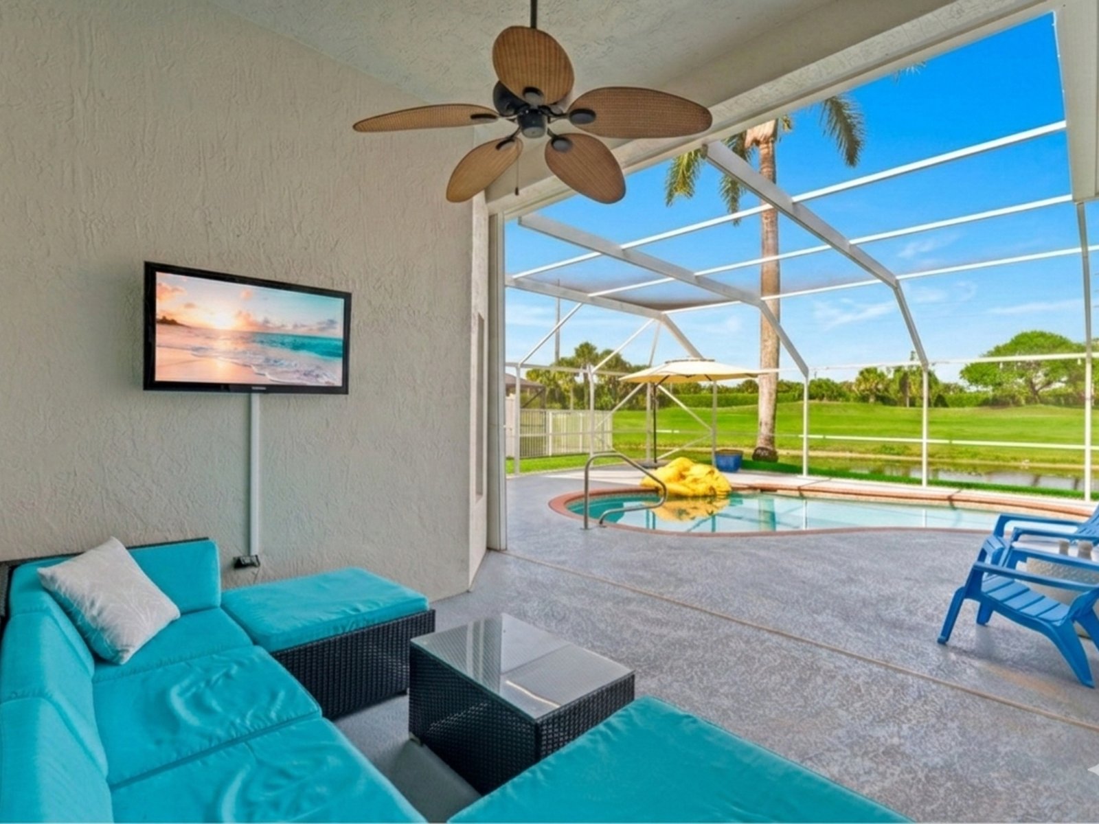 Covered patio and lanai with pool view